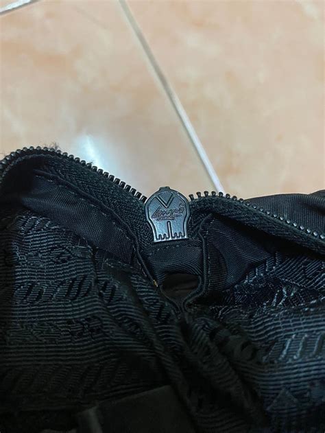 lampo zipper prada.